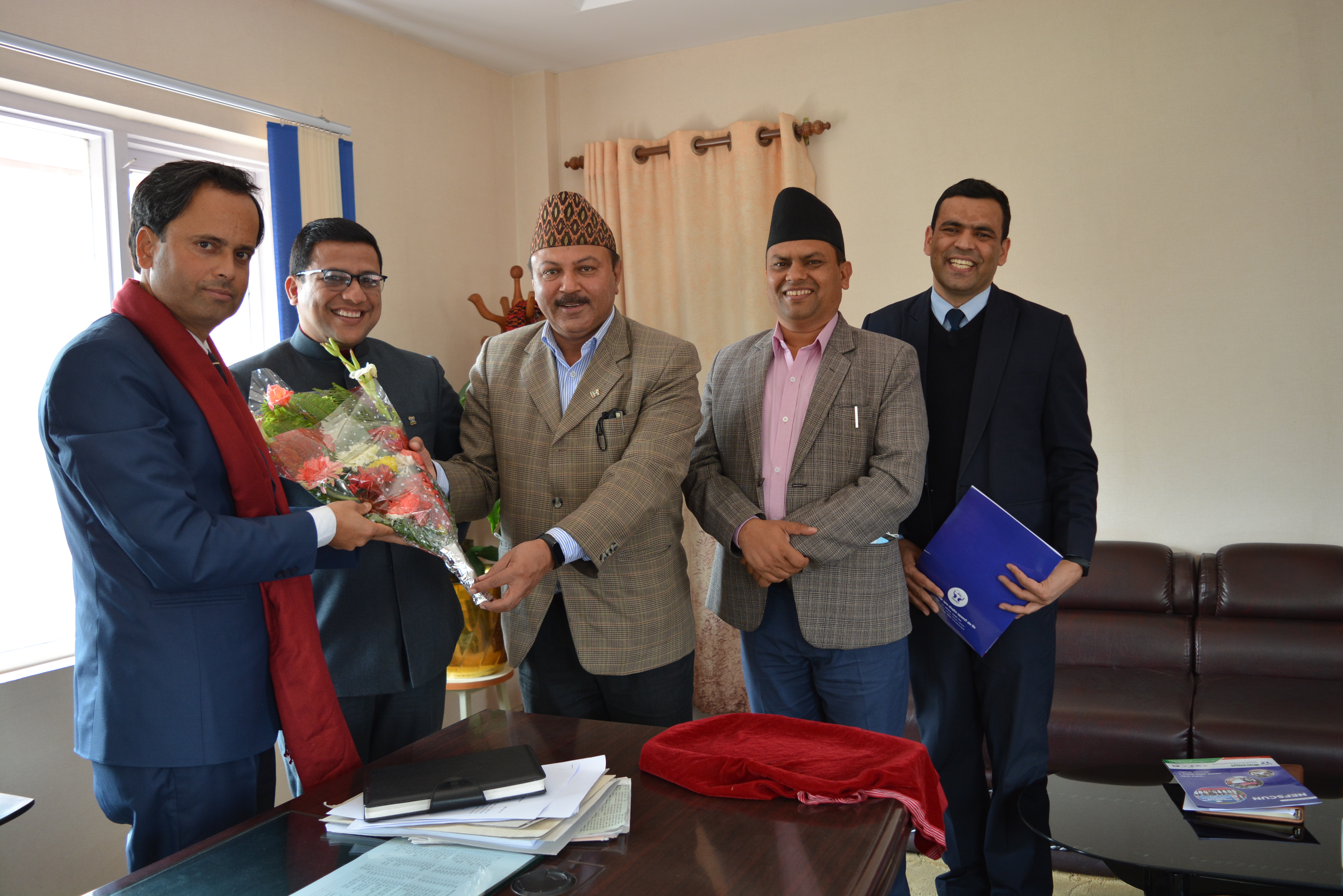 नवनियुक्त रजिष्ट्रार शर्मालाई नेफ्स्कूनद्वारा बधाइ एवम् शुभकामना